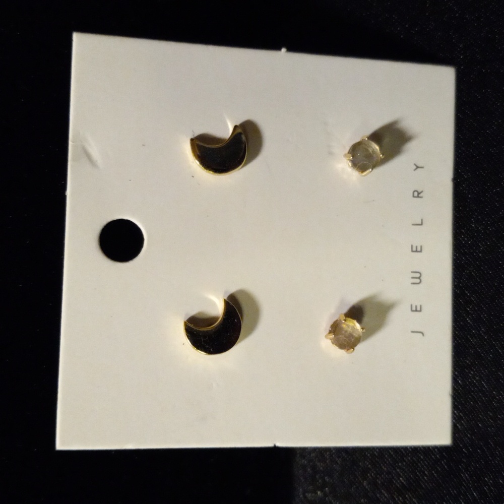 Two pairs of earrings.